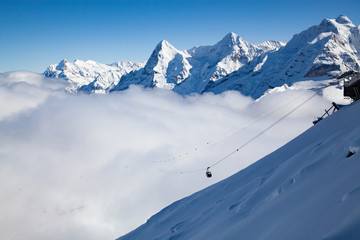 amazing snow covered peaks in the Swiss alps Jungfrau region from Schilthorn