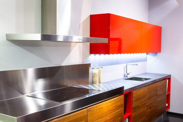 Professional kitchen interior of restaurant. Modern equipment and devices made of stainless steel. Empty kitchen in the morning.