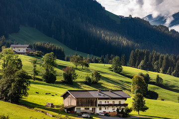 beautiful landscape traditional wooden farm house in the Alps of Tyrol Austria
