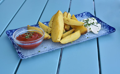 Bravas potatos a tipical spanish tapas. Beautiful and tasty food on a plate