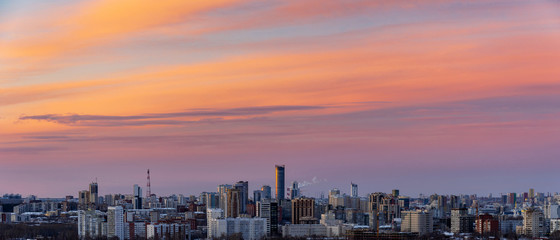 Fototapeta premium Dawn clouds over the metropolis of early winter sunset 6