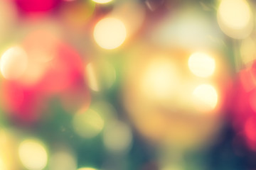 Christmas tree bokeh blur abstract background for merry x'mas party and new year celebration in red green gold color for xmas holiday night light 