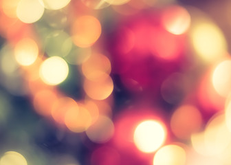 Christmas tree bokeh blur abstract background for merry x'mas party and new year celebration in red green gold color for xmas holiday night light 