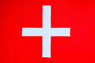 switzerland flag on cement