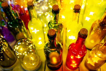 Blurry and delightful of spirits and liquor Bottles  at the bar,night scene.  .Abstract background.