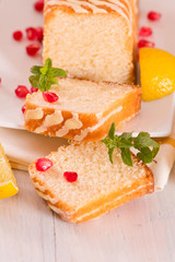 Lemon sponge cake with pomegranate.