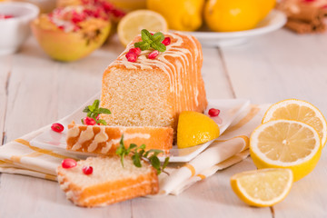 Lemon sponge cake with pomegranate.