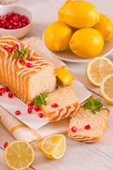 Lemon sponge cake with pomegranate.