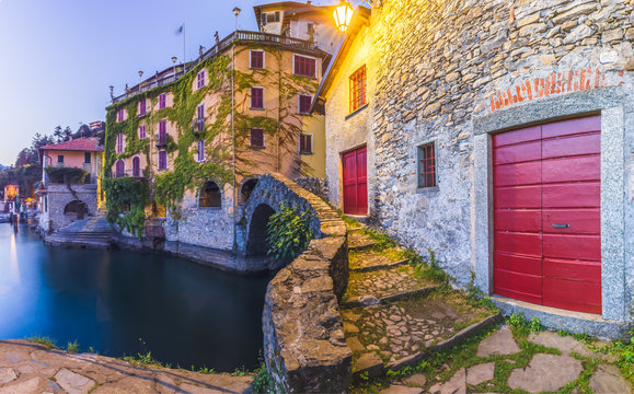 Old stone bridge at the end of Nesso's ravine, Como, Italy