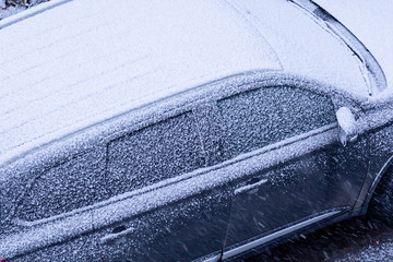 Frozen car windows. Concept: winter and frost, cooling.