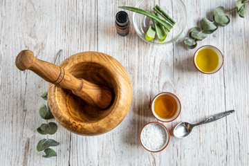 prepare your homemade cosmetics with a pestle and aloe vera, flat-lay