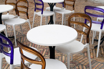 Empty cafe tables and chairs