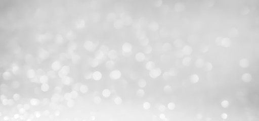 Abstract glitter bokeh on black background