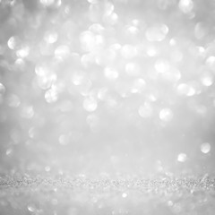 Abstract glitter bokeh on black background