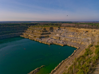 The quarry after the mining of minerals is filled with water. Aerial view.