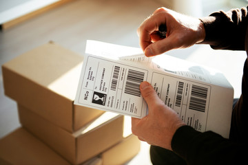 Delivery service, applying a shipping label