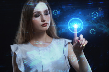 Business, Technology, Internet and network concept. Young businessman working on a virtual screen of the future and sees the inscription: Code of conduct