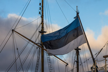 Estonia flag among the masts in the Maritime Museum "Seaplane Harbor". Tallinn