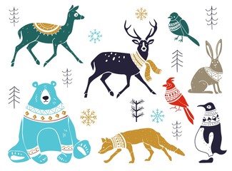 Vector collection of artistic hand drawn christmas decor elements in sketch style. Christmas collection with seasonal elements. Winter animals in a sweater Good for cards, gift tags, packaging design.