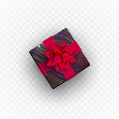 Decorative floral gift box with red bow.