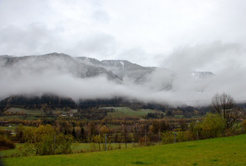 Winter vreak in t in a valleyhe mountains and high fog in a valley in Styria, Austria