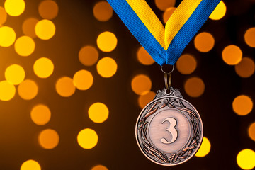 Third placed runner up medallion on a ribbon