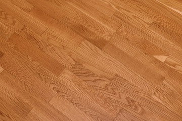 Brown laminate floor texture background. natural wooden polished surface parquet