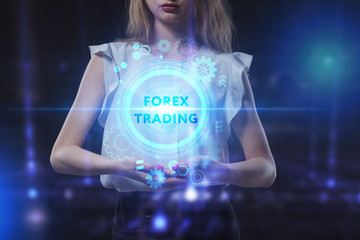 Business, Technology, Internet and network concept. Young businessman working on a virtual screen of the future and sees the inscription: Forex trading