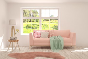 Stylish room in white color with sofa and summer landscape in window. Scandinavian interior design. 3D illustration