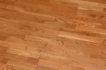 Brown laminate floor texture background. natural wooden polished surface parquet