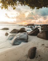 amazing tropical landscape view during sunrise on the paradise beaches of Seychelles on la digue, travel, luxury holiday concept