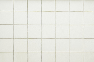 Old white tile wall background texture