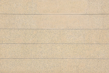 Old beige stone wall background texture