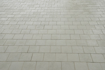 Old road grey mosaic pavement texture