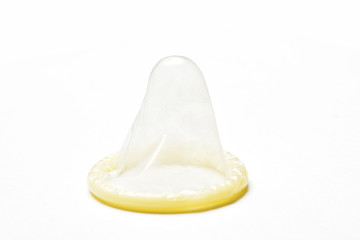 Contraceptive latex condom on white background