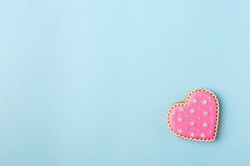 Pink cookie heart shaped with different patterns, blue background