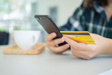 Online shopping with smartphone and shopping bags delivery service using as background shopping concept and delivery service concept with copy space  for your text or  design.