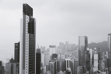 Hong Kong city landscape day and evening with lights. Skyscrapers overlooking the mountains and the sea day and evening. Night lights. China