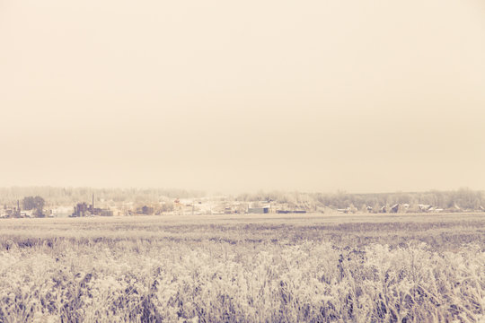 Beautiful winter landscape in russian province. Toned