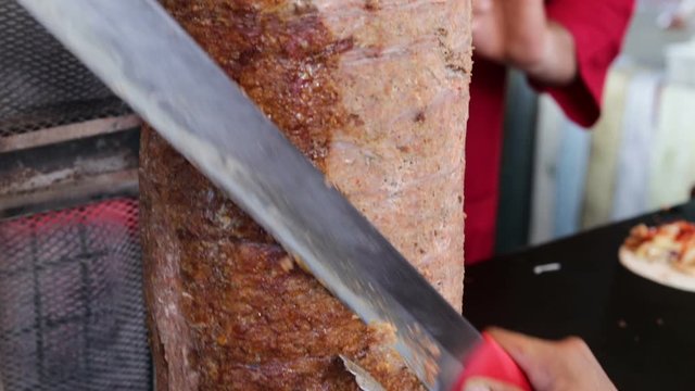Slicing Chicken kebub delicious street food.