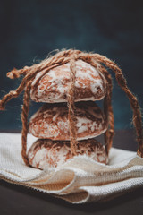 fresh gingerbread cookies tied with a rope on the table