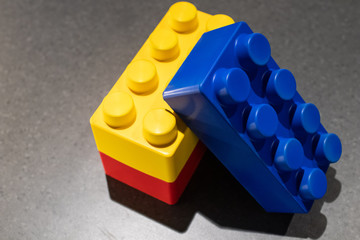 rectangular building blocks for children in yellow, blue and red colors. large format modular...