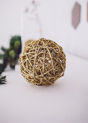 Christmas ball on table. Close up. Traditional Xmas and Happy New Year Symbol.