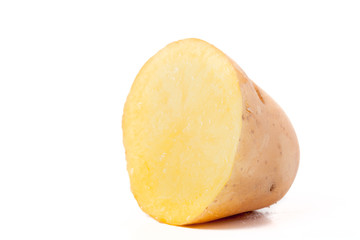 Young potato on light background