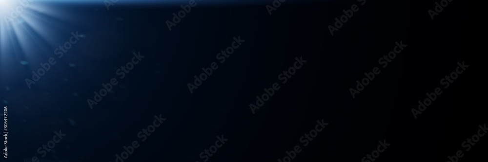 Poster blue lens flare effect overlay texture in front of a black background - banner format