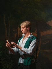 blogging is timeless, concept. A guy with a camera and a smartphone in the style of Renaissance paintings