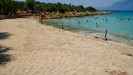 MUGLA, TURKEY - AUGUST 25, 2019: Cleopatra beach on the island of Sedir, with lively sands that can multiply