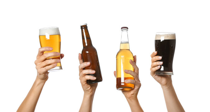Hands with beer on white background