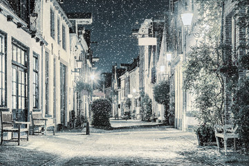 Shopping street with snowfall in the Dutch city center of Deventer © Martin Bergsma