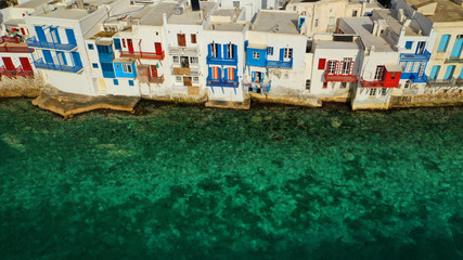 Obraz na płótnie Canvas Aerial drone photo of picturesque little Venice in main village of Mykonos island at sunset with beautiful colours, Cyclades, Greece
